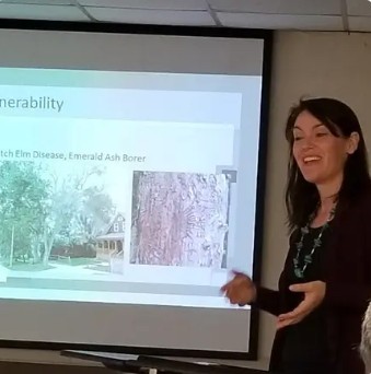 Mariah Menzie presenting at industry conference